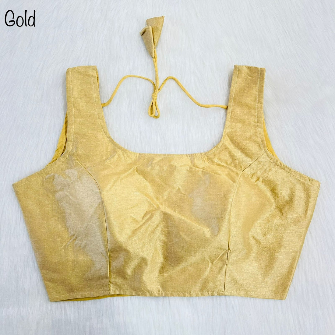 Golden blouse on a white background