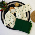 White embroidered blouse with green Saree