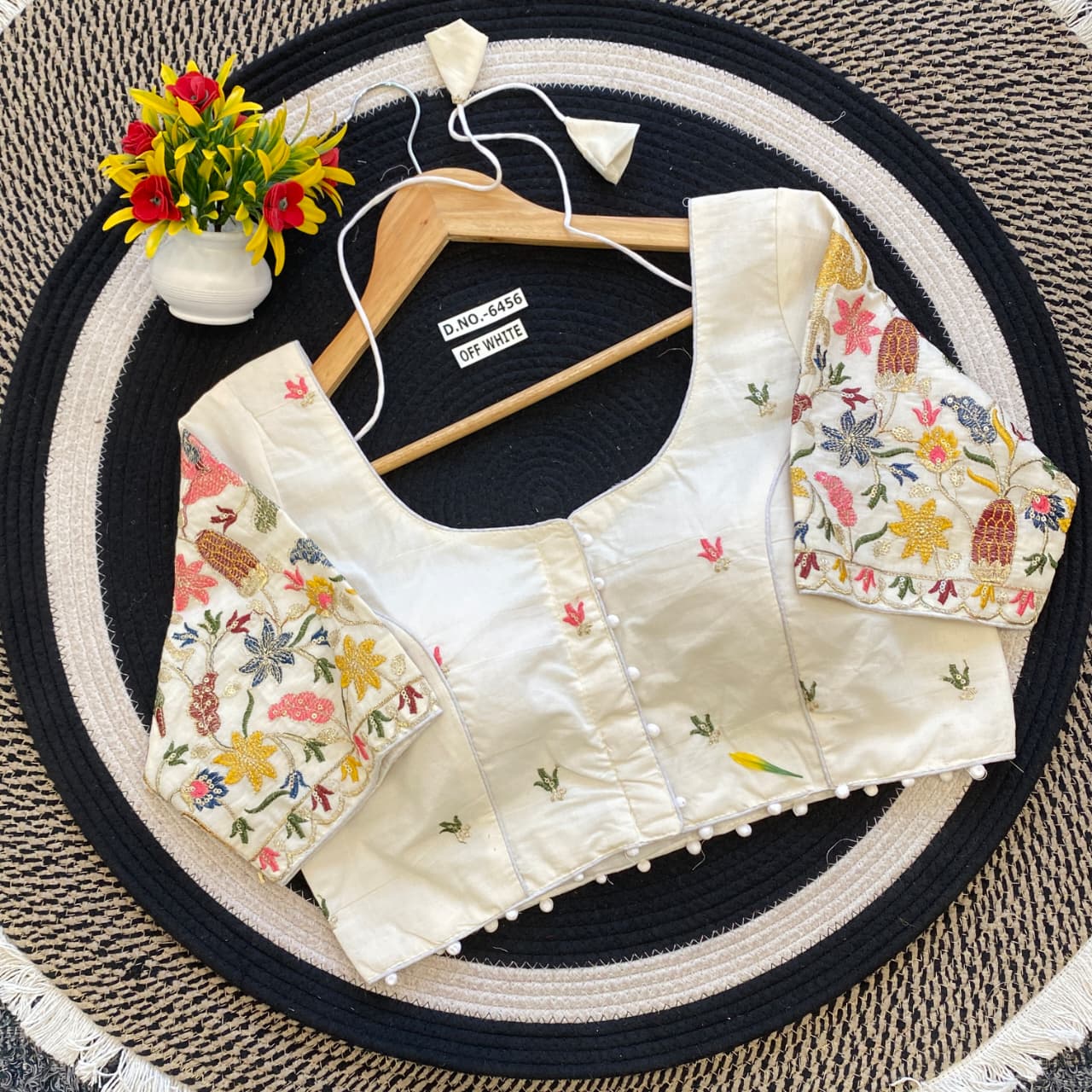 Embroidered white  khadi  blouse with floral  attern